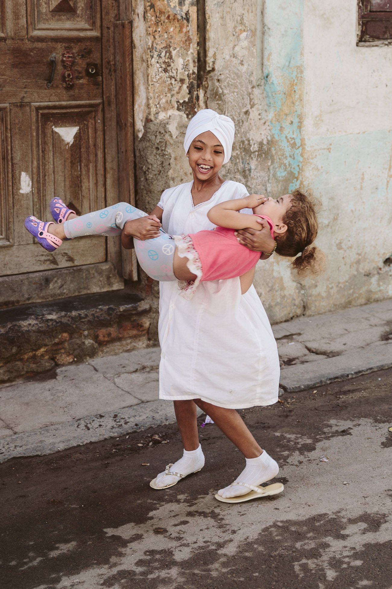 Kids play in the streets in Havana Cuba