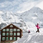 Kids playing in the snow at Kleine Scheidegg Jungfrau Switzerland