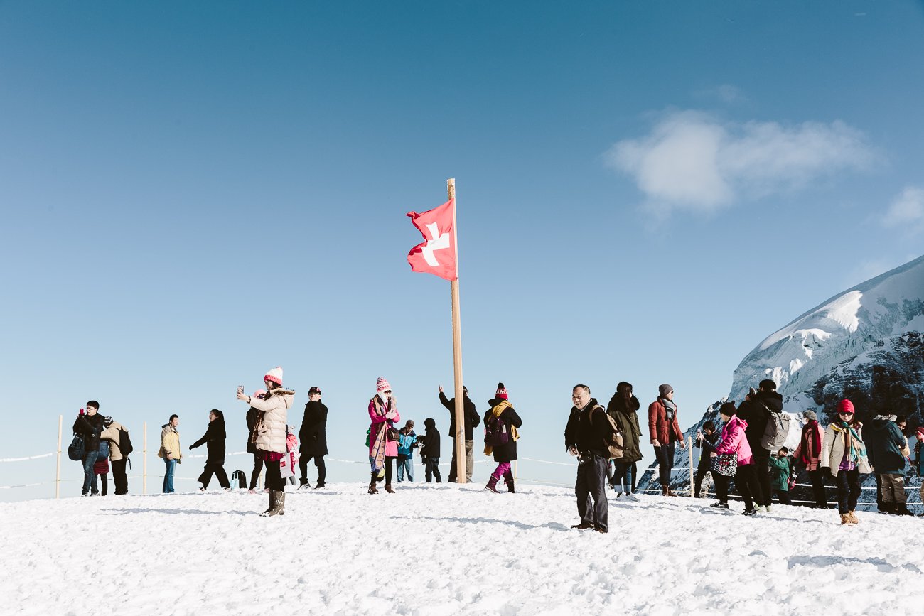 Asian tourists in the snow at Jungfraujoch