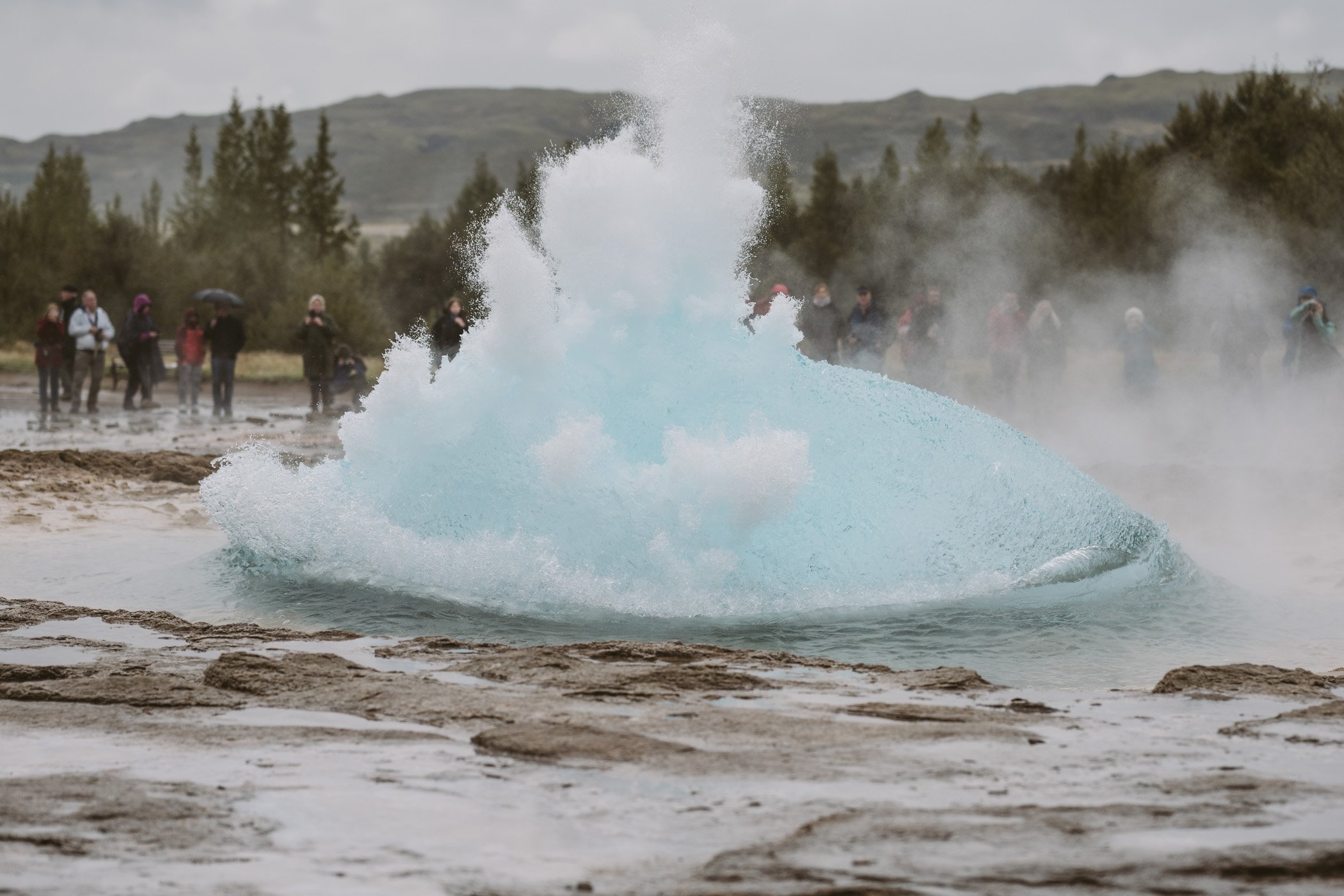 Strokkur geyser erupting in Iceland