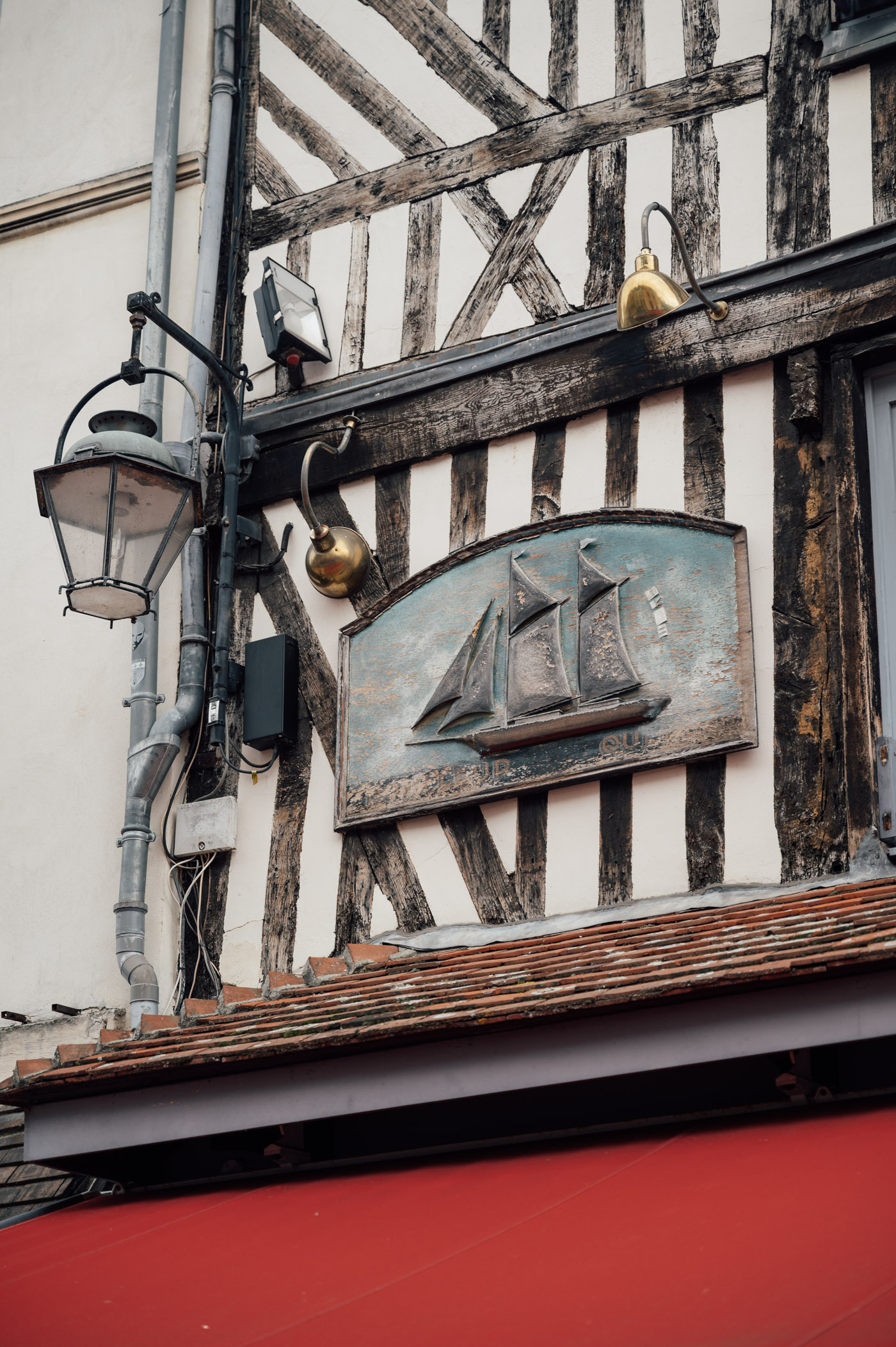 Ship relief at a half-timbered house in Honfleur Normandy