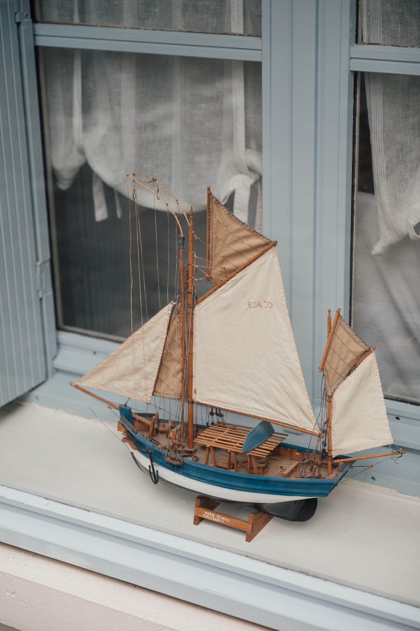 Boat model in a window in Honfleur Normandy