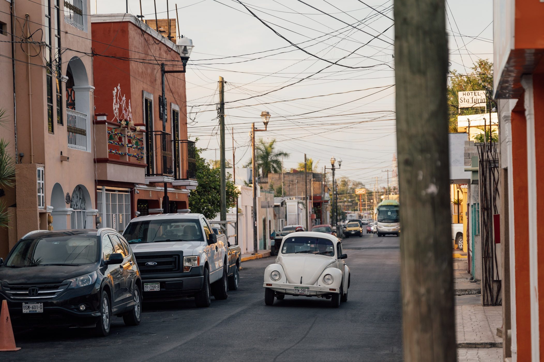 Valladolid street scene with the iconic old VW beetle, that was manufactured in Yucatan, Mexico