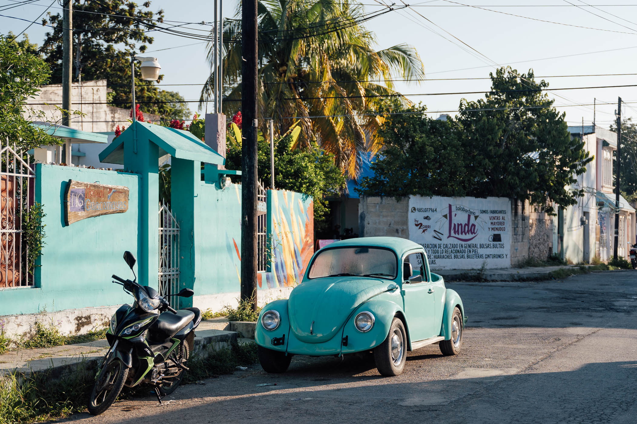 Valladolid street scene with the iconic old VW beetle, that was manufactured in Yucatan, Mexico