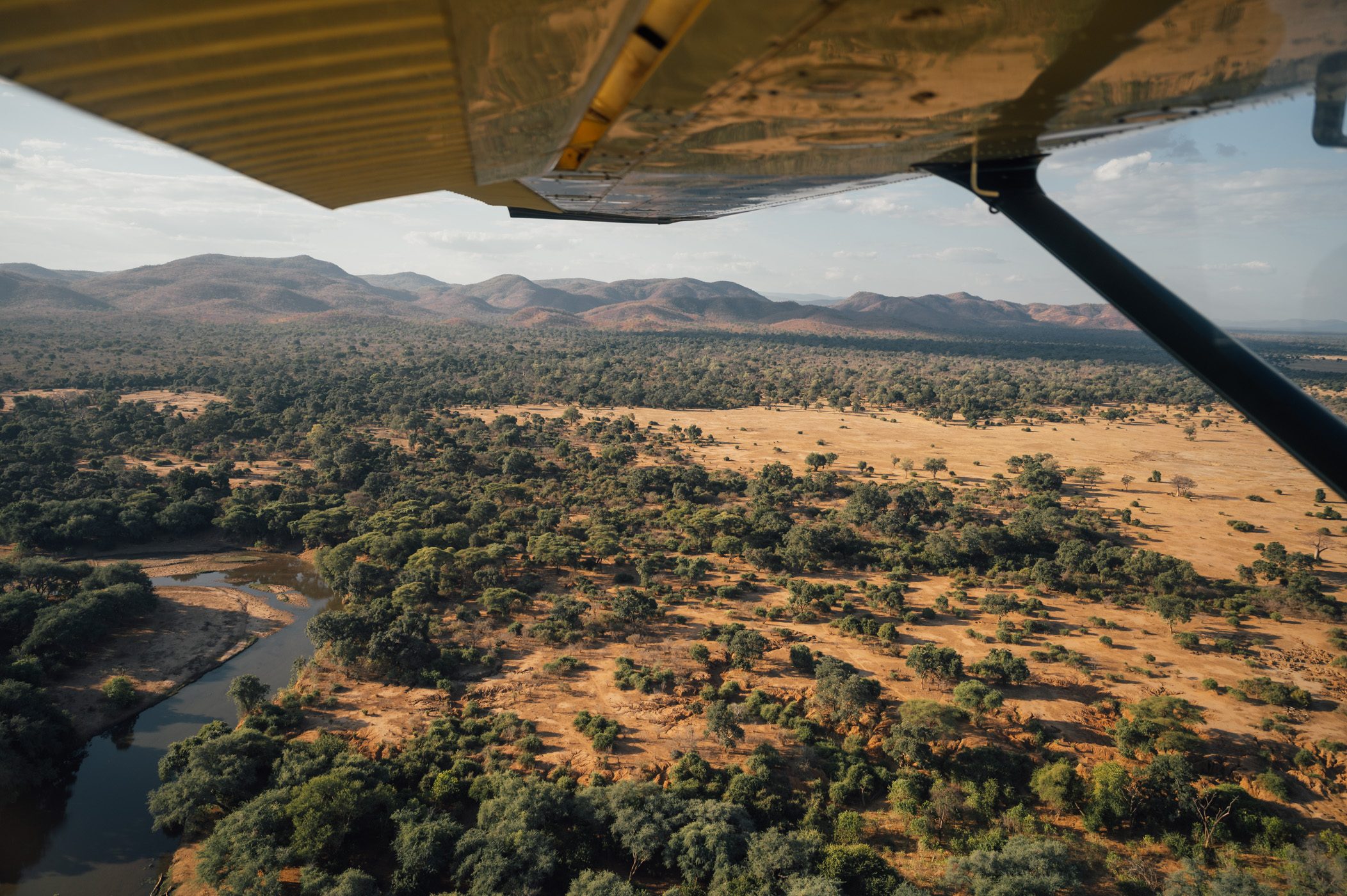 Bush plane flying into Lower Zambezi National Park in Zambia