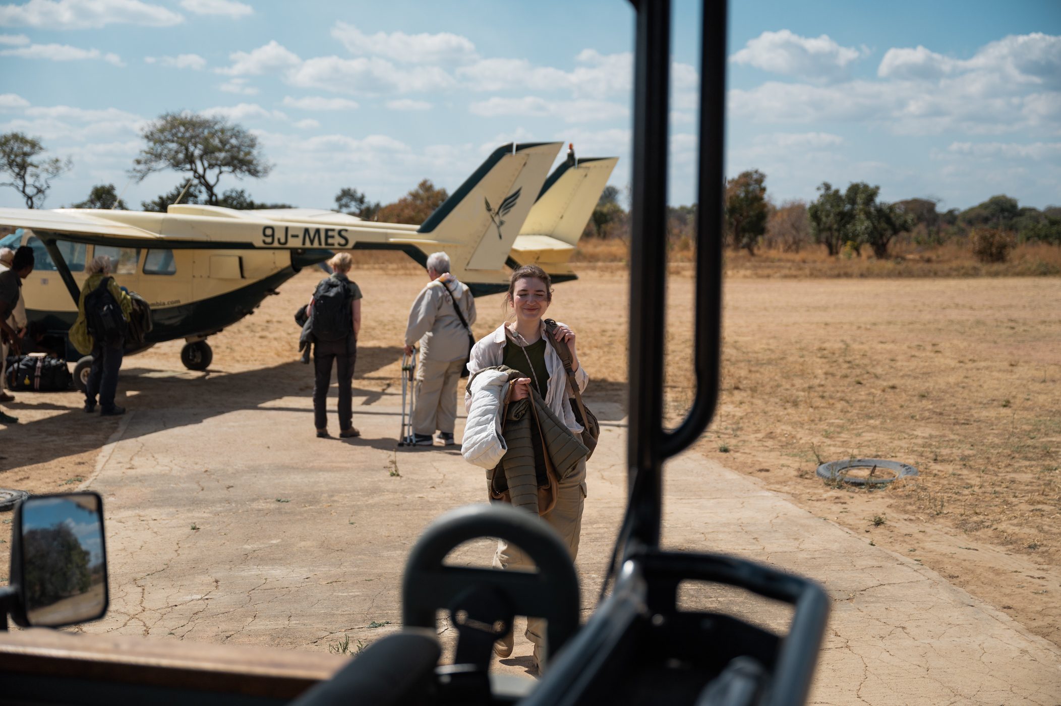 Kady leaving the bush plane in Zambia's Kafue National Park